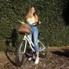 61whwuvqtHL._AC_.jpg WARNERS WHEELS Bike Basket for Women’s Cruiser with Coffee Cup Holder, Handmade Woven Bicycle Baskets mounts to Entrance Handlebars of Beach Cruisers or Scooters with Vegan Leather-based Straps